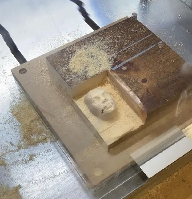 Finished CNC-milled face in a wood block