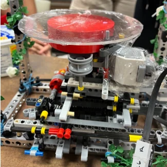 FrostBot V1 with a dessert on the turntable